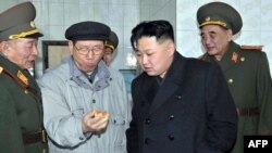 North Korean leader Kim Jong Un (second from right) inspects the Strategic Rocket Force Command of the Korean People's Army at an undisclosed location in North Korea (file photo).