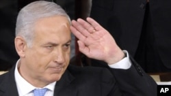 U.S. -- Israeli Prime Minister Benjamin Netanyahu responds to the applause after he addressed a joint meeting of Congress on Capitol Hill in Washington, DC, 24May2011