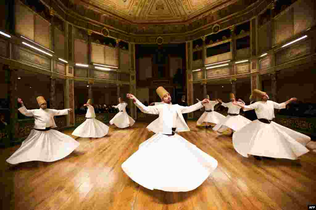 Whirling dervishes perform at the Galata Mevlevihane ("The Lodge of the Dervishes") in Istanbul. (AFP/Gurcan Ozturk)