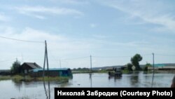 Село Гадалей в Тулунском районе Приангарья во время наводнения