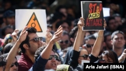 A protest against acid attacks in Iran, often targeting women,Tehran, October 22, 2014.