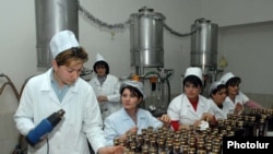 Workers at an Armenian brandy factory in the Armavir region