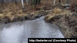 Река Кийзас, загрязненная угольщиками