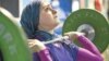 Kulsoom Abdullah, a Pakistani-American who competes for Pakistan, challenged the International Weightlifting Federation&#39;s rules to allow her to compete in U.S. national competitions.&nbsp;