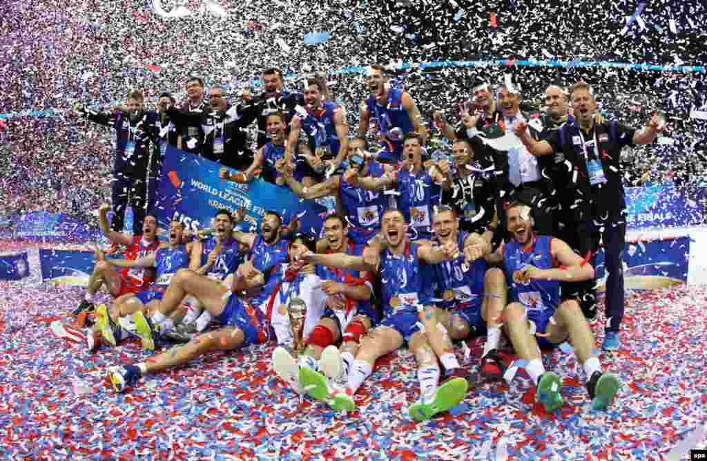 Players from the Serbian national team celebrate after winning first place at the FIVB Volleyball World League 2016 Final Six tournament in Krakow, Poland, on July 17. (epa/Stanislaw Rozpedik)