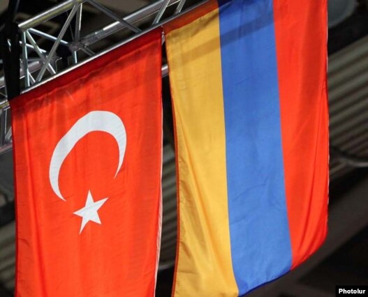 Armenia -- Turkish and Armenian flags fly alongside each other during an international sporting event in Yerevan, undated.