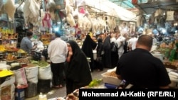 سوق باب السراي في الموصل عشية عيد الاضحى