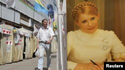 A man walks past tents at a protest camp by supporters of Yulia Tymoshenko (pictured) in central Kyiv.