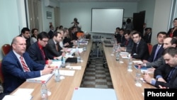 Armenia - EU (L) and Armenian officials begin a new round of free trade talks in Yerevan, 16Apr2013.