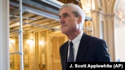 Special Counsel Robert Mueller departs after a meeting on Capitol Hill in Washington in June.