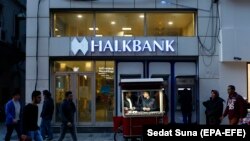 A street vendor in front of the Turkish Halkbank, in Istanbul, November 30, 2017