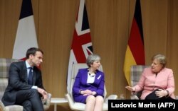 Франциянын президенти Эммануэл Макрон, Британиянын премьер-министри Тереза Мэй, Германиянын канцлери Ангела Меркел. Белгия, 22-март, 2018-жыл