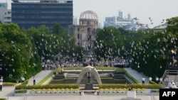 В Мемориальном парке мира в Хиросиме. 6 августа 2013 года.