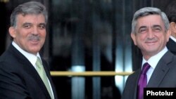 Armenian President Serzh Sarkisian (right, with Turkish President Abdullah Gul in Bursa last year) said suspension was in Armenia's "best interests."