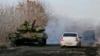Российский танк возле деревни Рассыпное на востоке Украины 