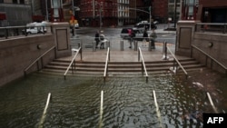 Water floods shops in Manhattan, in New York City, on October 30 in the wake of Sandy.