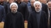 حسن روحانی (راست) و صادق آملی لاریجانی، روسای قوای مجریه و قضاییه جمهوری اسلامی ایران.