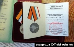 Российская медаль "За возвращение Крыма", по данным СБУ, найденная у Кирилла Вышинского