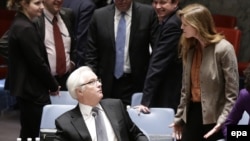 U.S. Ambassador to the UN Samantha Power talks with her Russian counterpart, Vitaly Churkin, at the United Nations on March 15.