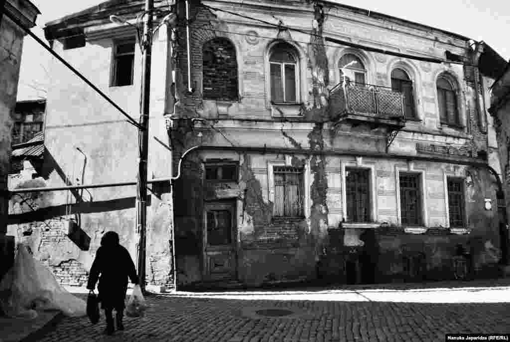 Nanuka Japaridze says she tried her best to capture a moment of optimism in Tbilisi&#39;s old lanes that day. &quot;But the pictures I shot all look melancholy. The sunny weather wasn&#39;t enough to create the joy I remember of Tbilisi&#39;s streets. Today you see only a few people outside and they&#39;re all so sad. In my childhood it was the other way round, the streets were full of people and there was happiness on their faces.&quot;