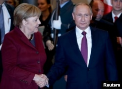 German Chancellor Angela Merkel and Russian President Vladimir Putin (file photo)