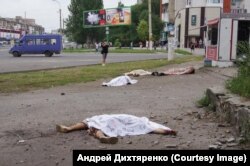 Victime pe stradă în in Lugansk.