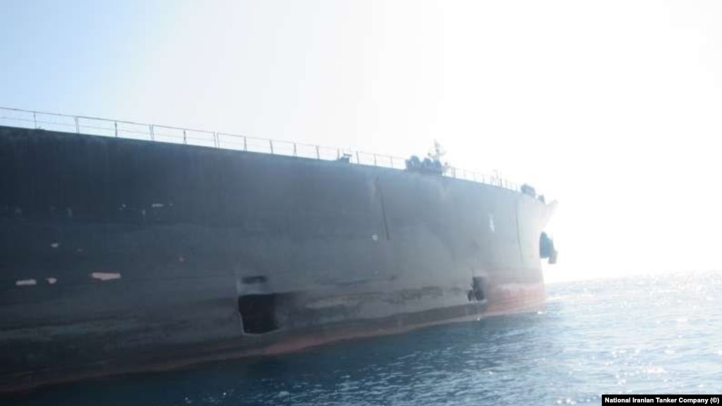 Images released Monday showed a pair of gaping holes in the hull of an Iranian oil tanker that Tehran says was hit by two missiles off the coast of Saudi Arabia in a mysterious attack last week that threatened to ratchet up tensions.