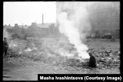 Rubbish smoldering on a Leningrad street in 1978.