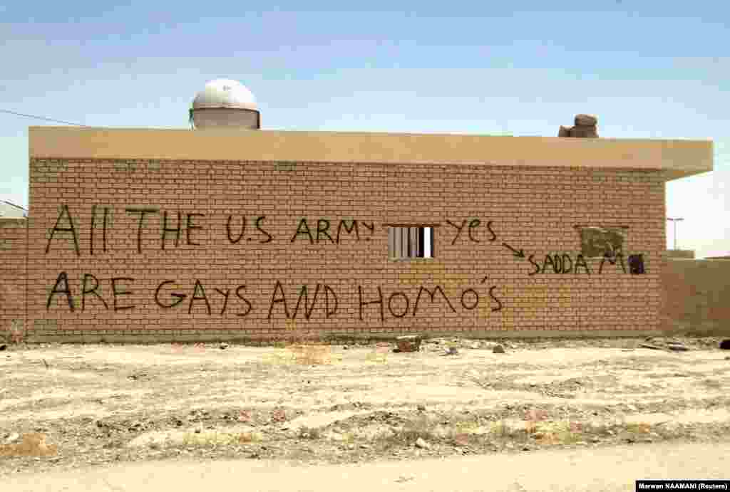 A house in Tikrit daubed in graffiti in 2003 during the U.S. invasion. The Iraqi city is the hometown of former dictator Saddam Hussein.