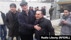 Basir Suleymanli (second from right), who heads an election-monitoring NGO, after his release from prison under President Ilham Aliyev's clemency decree on March 19.