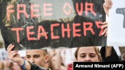 Students of Mehmet Akif College demonstrate against the arrest of their teachers in Pristina on March 29.