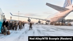 A Boeing 747 with some 300 U.S. Marines who were attending a six-month training session to learn about winter warfare lands in Stjordal, Norway, on January 16, 2017.