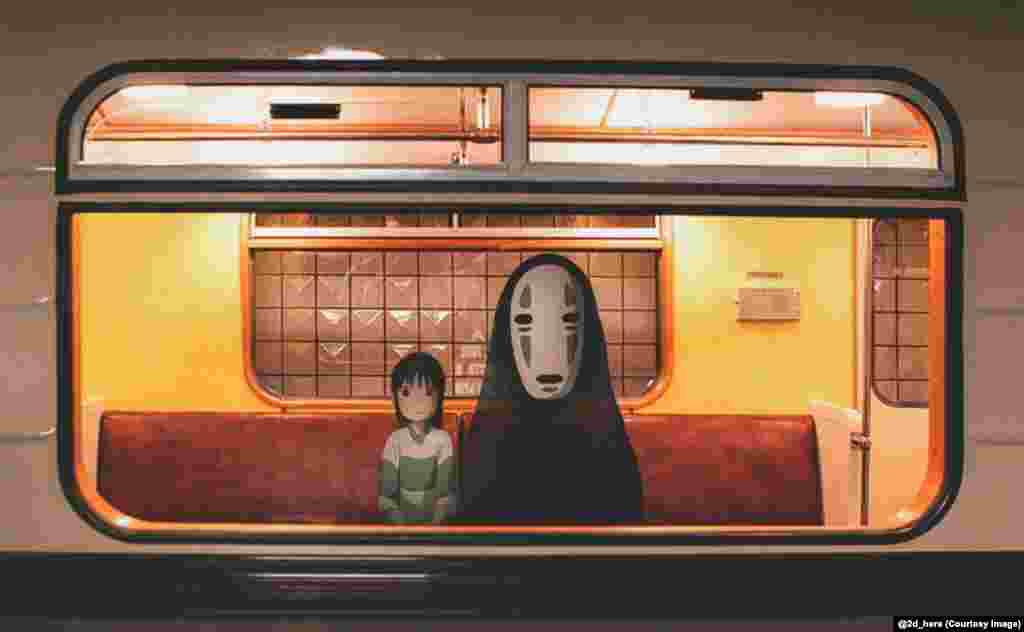 Chihiro and No-Face, from the Japanese anime fantasy film Spirited Away, ride the metro.&nbsp;