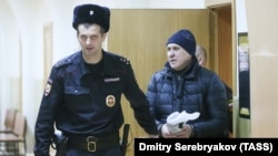 Roskosmos director Vladimir Yevdokimov (right) was arrested in December on suspicion of fraud.