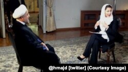 Иран президенті Хассан Роухани (сол жақта) NBC тілшісі Энн Карриге сұхбат беріп отыр. Тегеран, 18 қыркүйек 2013 жыл.