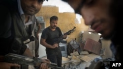 Opposition fighters in the northern city of Aleppo on May 27