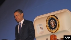 President Obama steps off Air Force One upon arrival in Ankara
