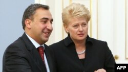 Georgian Prime Minister Nika Gilauri (left) meets with Lithuania President Dalia Grybauskaite in Vilnius.
