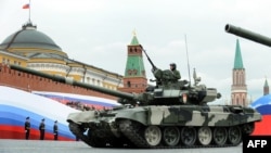 Russia -- A T-90 tank drives through the Red Square during a Victory Day parade rehearsal in Moscow, 06May2010