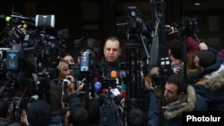 Armenia - Vigen Sargsian, the Republican Party's top election candidate, speaks to reporetrs outside a polling station in Yerevan, December 9, 2018.