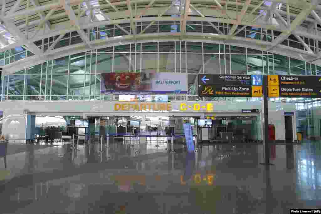 An empty departure terminal is seen in Bali, Indonesia, on April 24. Indonesia is suspending passenger flights and rail services as it restricts people in the world&#39;s most populous Muslim nation from traveling to their hometowns during the Islamic holy month of Ramadan because of the coronavirus outbreak.