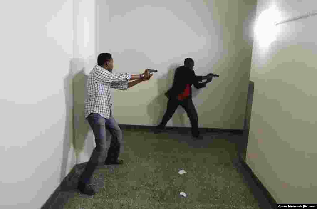 Armed police search Nairobi&#39;s Westgate Shopping Center during a September 2013 attack carried out by Islamic militants that left 71 people dead. In the confusion of the early minutes of the attack, Tomasevic joined a small group of police and civilians who entered the mall, rescuing scores of trapped civilians and engaging in gun battles with the attackers.