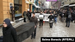 The group held a symbolic funeral for human rights in Sarajevo on December 10.