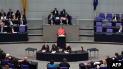 Germany -- German Chancellor Angela Merkel speaks at the Bundestag in Berlin, July 17, 2015