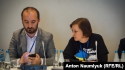 Журналист Осман Пашаев и правозащитница Ирина Седова на конференции ОБСЕ в Варшаве, 17 сентября 2018 год 