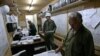 Technicians work at the Bushehr Nuclear Power Plant, some 750 miles (1,245 kilometers) south of the capital Tehran, Iran, Tuesday, April 3, 2007.