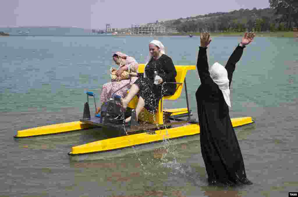 Vacationers at the Laguna women&#39;s resort in the village of Aldy, Chechnya, on August 4. (Elena Afonina/TASS)