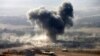 Дым над позициями "Исламского государства" в окресностях Мосула