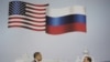 Russia -- U.S. President Barack Obama (L) and President of Russia Dmitry Medvedev shake hands after delivering speeches at the Russian-American business summit, Moscow, 07Jul2009