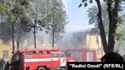 Firefighters battle the blaze at Khujand University's Arts Faculty.